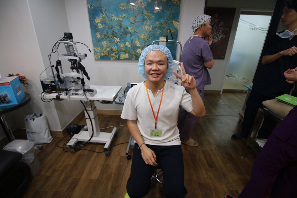Man smiling before eye surgery
