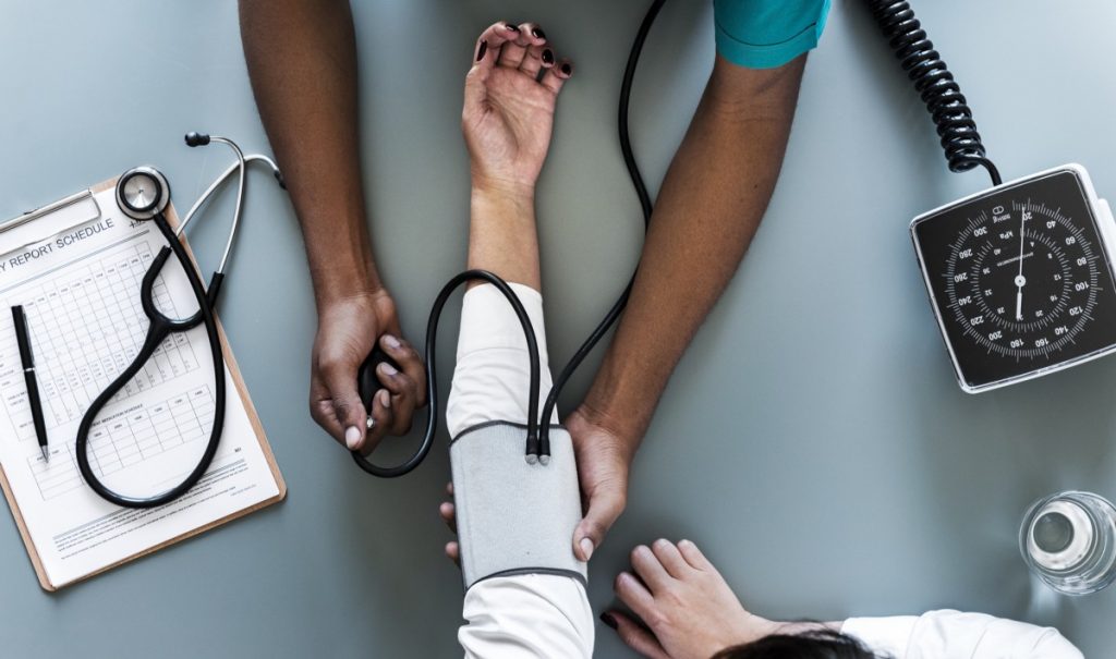 Doctor examining a patient